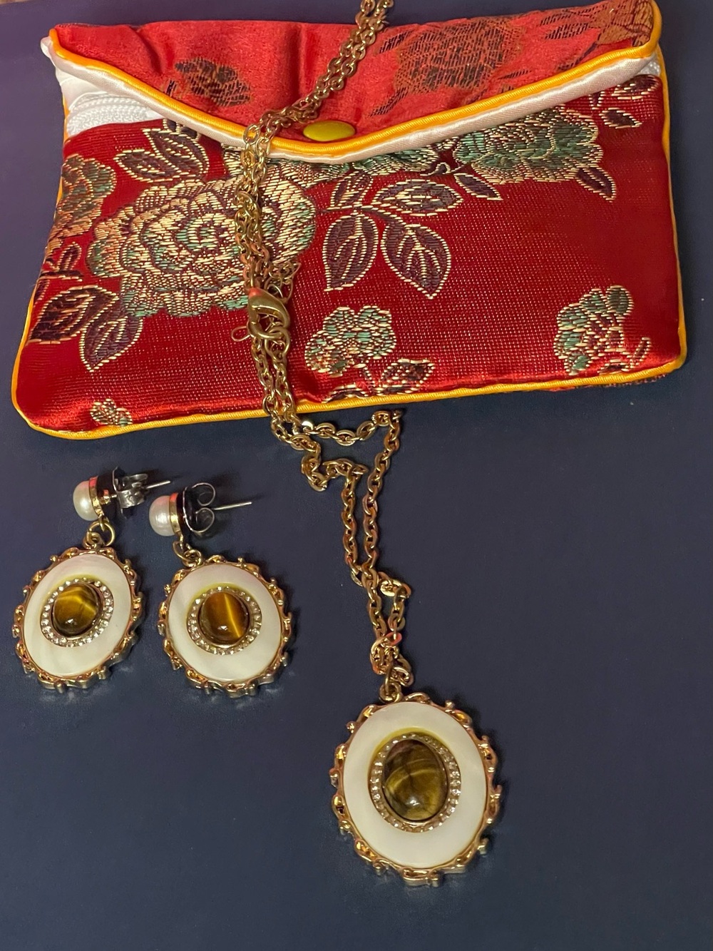 Gold Chain and Earrings with round Enamel center and Tiger eyes stone and Pearls